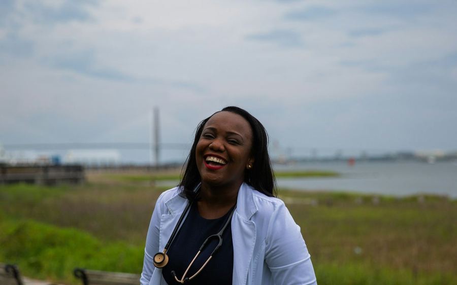A family doctor in her consulting room